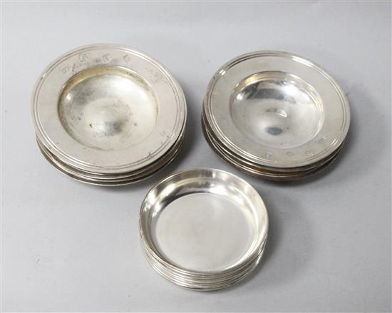 A set of seven modern silver dishes and another set of eight smaller silver dishes 15.3 oz.